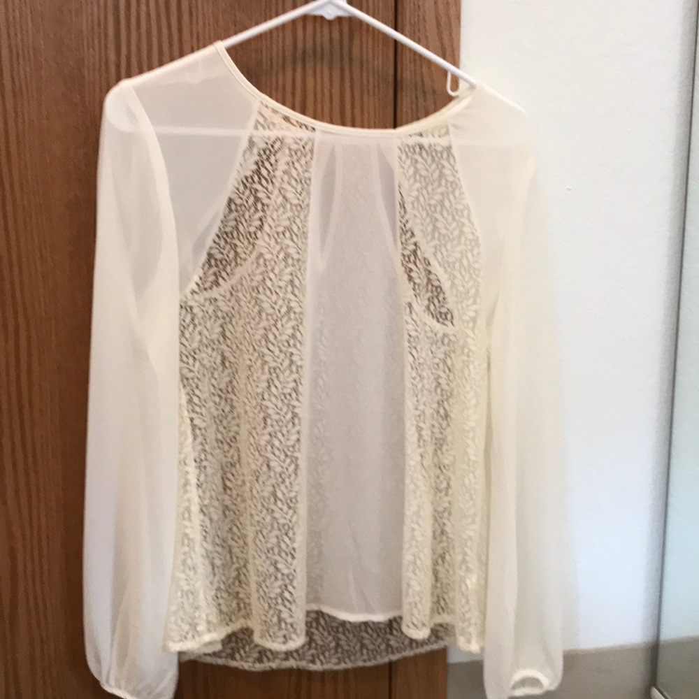 Cream sheer and lacy blouse
